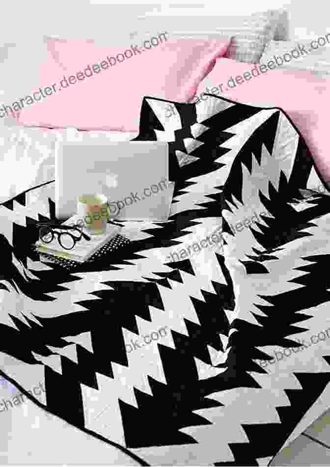 A Black And White Quilt With A Geometric Design Fat Quarter Favorites: 13 Eye Catching Quilts You Ll Love To Make