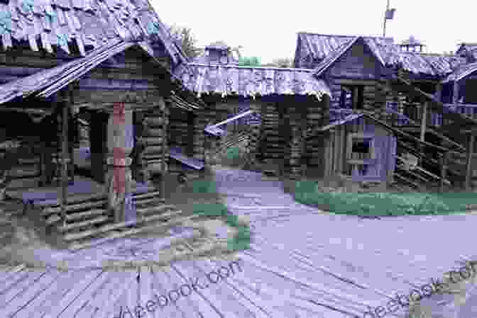 A Bustling Viking Settlement, Its Wooden Buildings Clustered Around A Central Mead Hall, Presents A Scene Of Everyday Life. The Story Of The Vikings (Illustrated)
