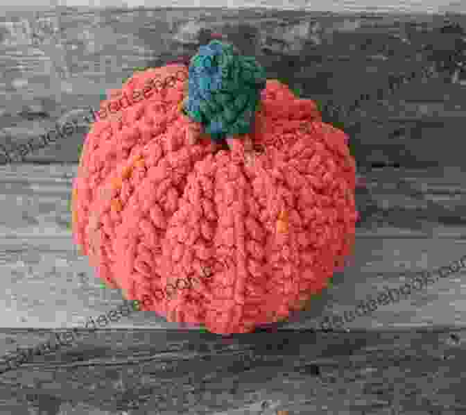 A Cozy Crochet Wreath Featuring A Large, Chunky Pumpkin In A Warm, Earthy Shade Of Orange FREE PATTERNS CROCHET FALL WREATHS: Wreaths Add A Elegant Issue To Your Seasonal Decorations