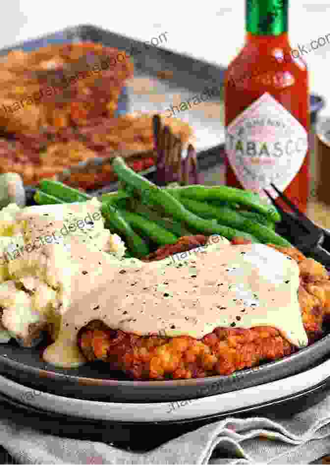 A Golden Brown Chicken Fried Steak With Creamy Gravy Eat Like A Local Texas : Texas State Food Guide (Eat Like A Local United States)