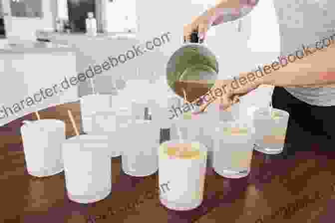 A Photo Of A Person Pouring Melted Wax Into A Candle Container Candle Making Business: The Guide For Beginners On How To Make Homemade Candles In 8 Easy Steps And Make Money From Home