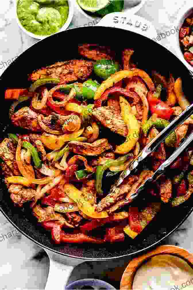 A Sizzling Fajita Platter With Colorful Peppers, Onions, And Tender Meat Eat Like A Local Texas : Texas State Food Guide (Eat Like A Local United States)